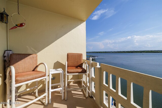 3606 S Peninsula Dr Unit 406, Port Orange, FL 32127 - balcony featuring a water view