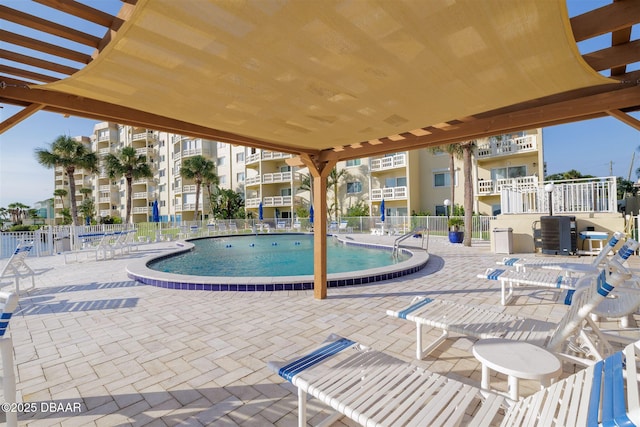 3606 S Peninsula Dr Unit 406, Port Orange, FL 32127 - community pool featuring a patio area