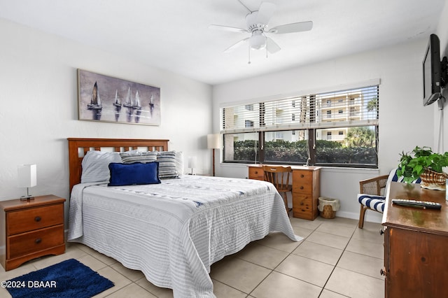 4175 S Atlantic Ave Unit 1130, New Smyrna Beach, FL 32169 - bedroom with light tile patterned floors and ceiling fan