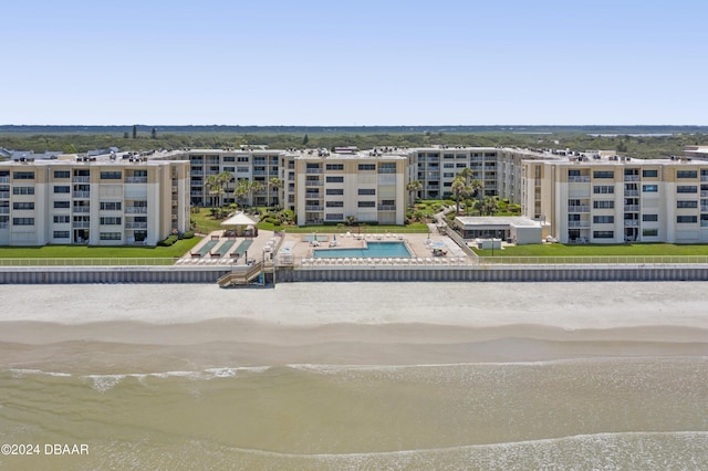 4175 S Atlantic Ave Unit 1130, New Smyrna Beach, FL 32169 - aerial view of a pool, a nearby body of water, and apartment complex