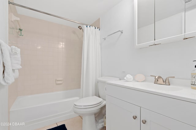 full bathroom with toilet, shower / bath combo, tile patterned floors, and vanity