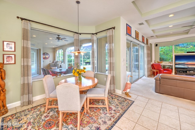 dining room with ceiling fan and light tile patterned flooring