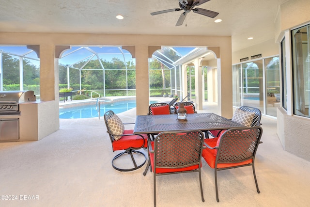 interior space with ceiling fan and a grill