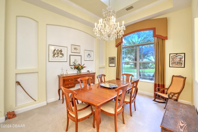 carpeted dining space featuring a raised ceiling, an inviting chandelier, and crown molding