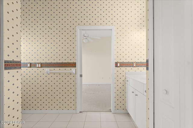 bathroom featuring vanity, ceiling fan, and tile patterned flooring