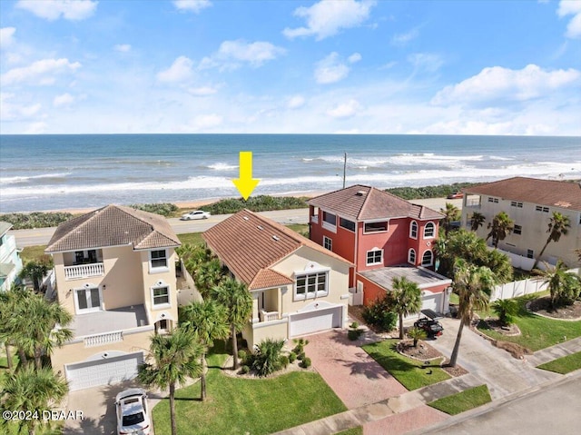 aerial view featuring a beach view and a water view