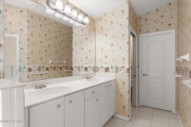 bathroom with vanity and tile patterned floors