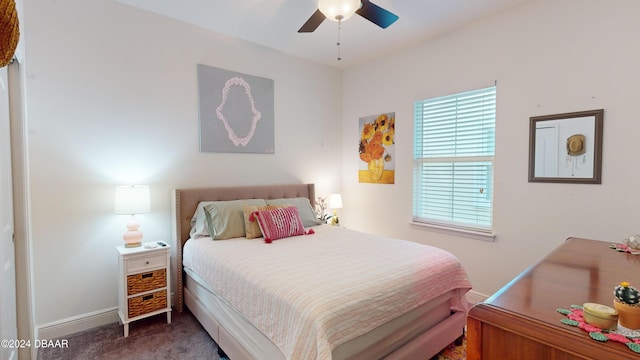 bedroom with dark carpet and ceiling fan