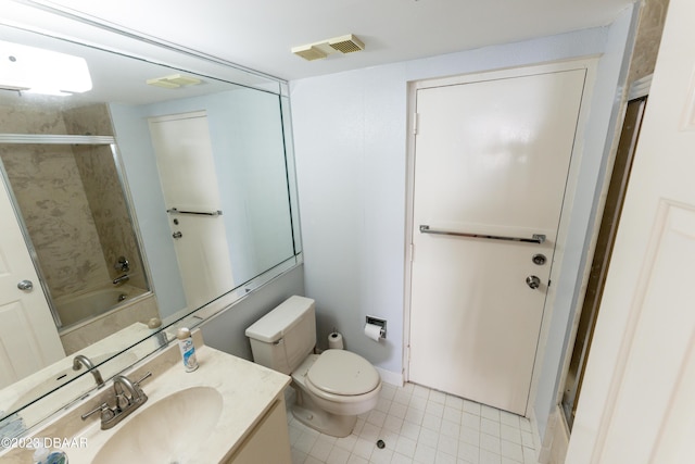 full bathroom featuring vanity, tile patterned flooring, toilet, and combined bath / shower with glass door