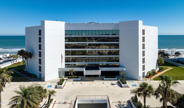 view of building exterior with a water view