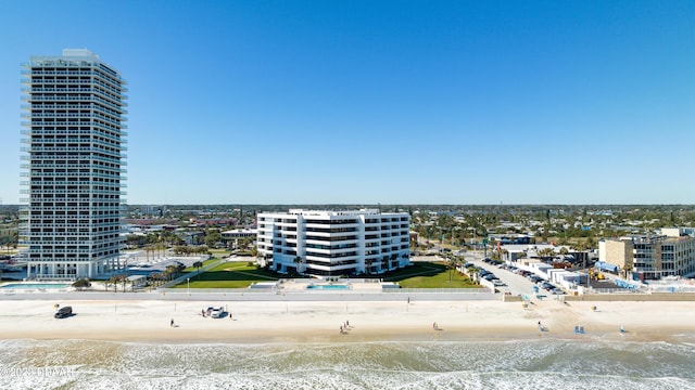 aerial view featuring a water view and a view of the beach