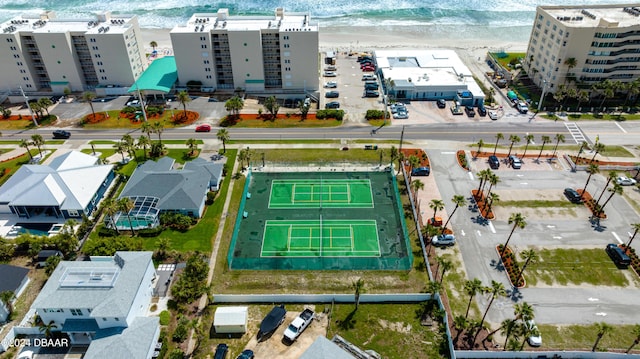 bird's eye view with a view of the beach and a water view