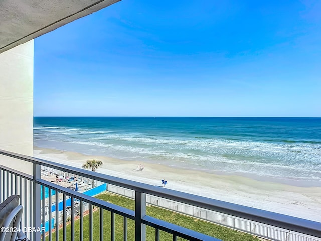 view of water feature with a beach view