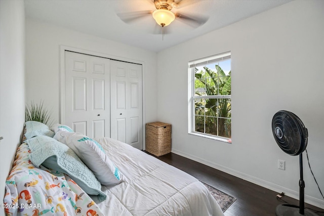 16 Powder Hill Ln, Palm Coast, FL 32164 - bedroom featuring dark wood finished floors, baseboards, ceiling fan, and a closet