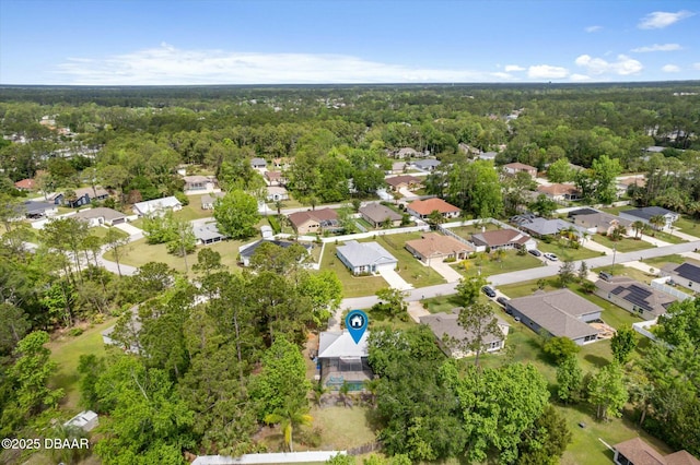 16 Powder Hill Ln, Palm Coast, FL 32164 - bird's eye view with a forest view and a residential view