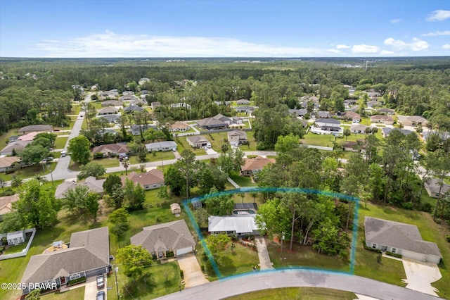 16 Powder Hill Ln, Palm Coast, FL 32164 - drone / aerial view featuring a residential view and a wooded view