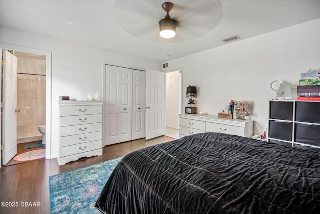 16 Powder Hill Ln, Palm Coast, FL 32164 - bedroom featuring a textured ceiling, wood finished floors, visible vents, and a closet