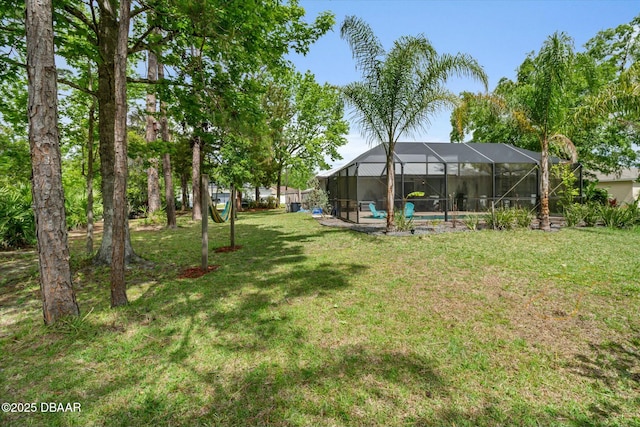 16 Powder Hill Ln, Palm Coast, FL 32164 - view of yard featuring a lanai