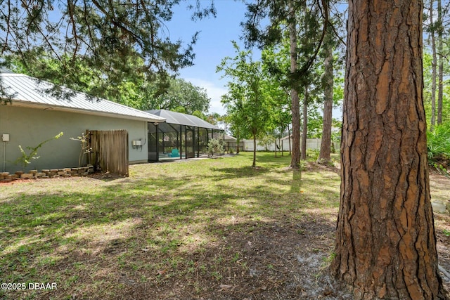 16 Powder Hill Ln, Palm Coast, FL 32164 - view of yard featuring glass enclosure and a fenced backyard
