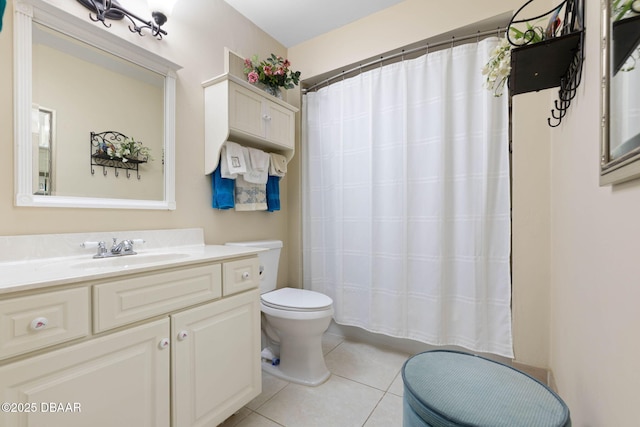 bathroom featuring vanity, tile patterned floors, toilet, and a shower with shower curtain