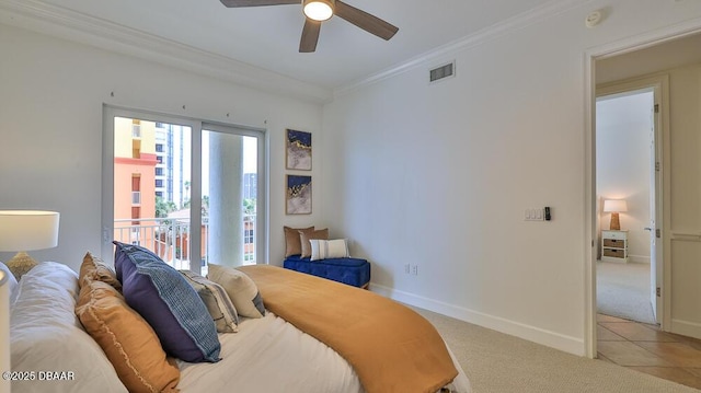 bedroom featuring crown molding, light carpet, baseboards, and ceiling fan