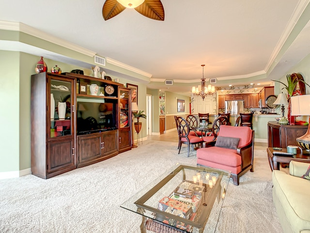 carpeted living room featuring ceiling fan with notable chandelier and crown molding