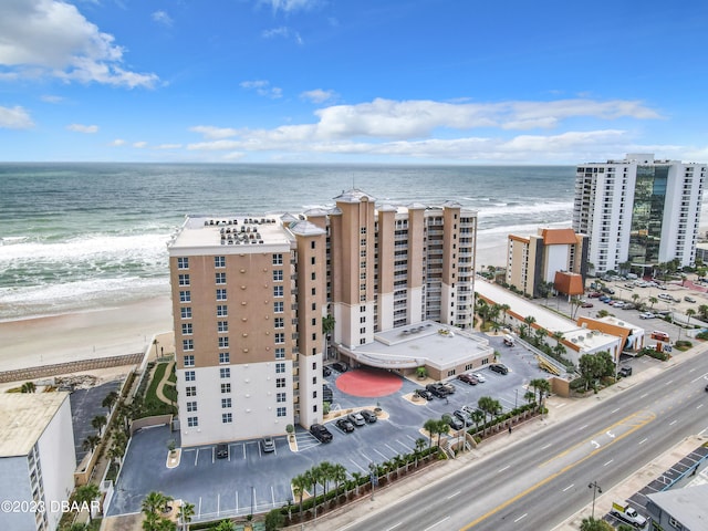 aerial view with a beach view and a water view