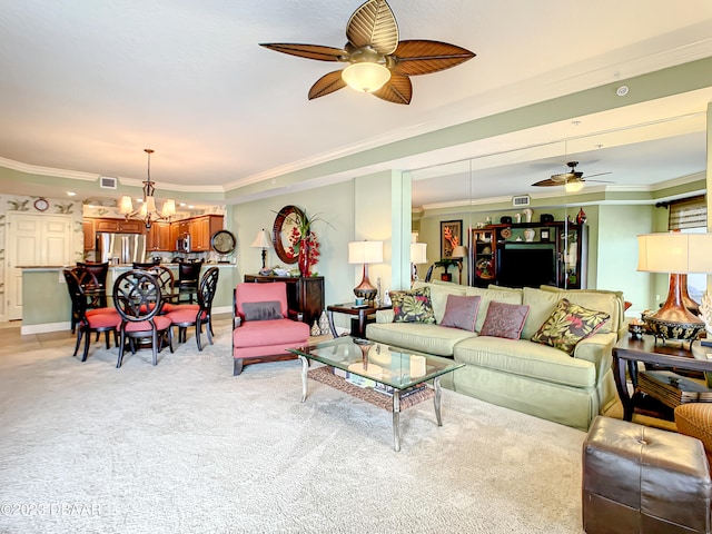 carpeted living room with ceiling fan with notable chandelier and crown molding