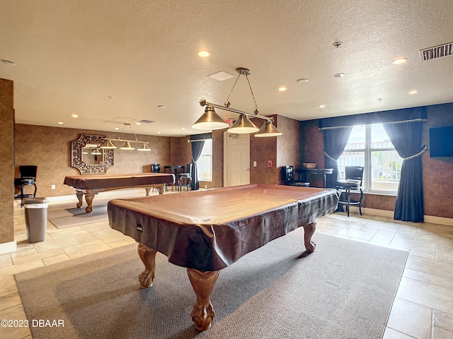 rec room featuring billiards and a textured ceiling