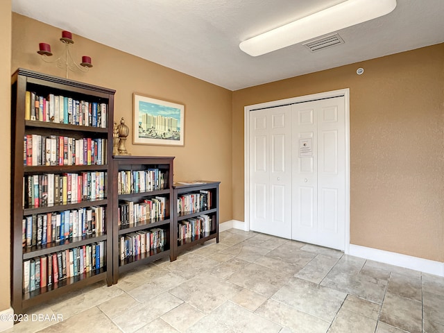 interior space featuring a textured ceiling