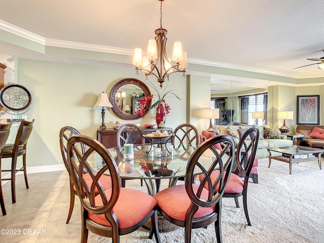 tiled dining area featuring a textured ceiling, ceiling fan with notable chandelier, and crown molding