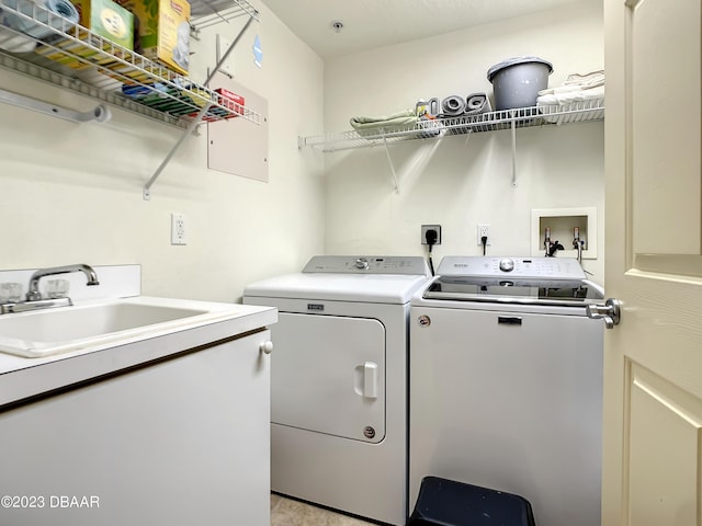 2403 S Atlantic Ave Unit 409, Daytona Beach Shores, FL 32118 - washroom featuring washer and clothes dryer