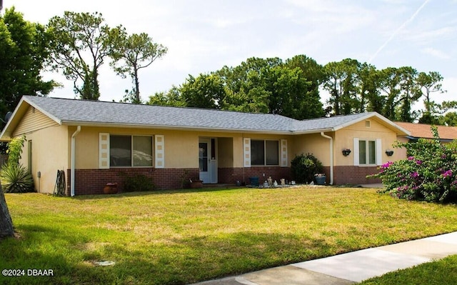 ranch-style house with a front yard