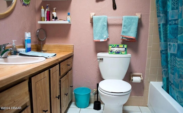 full bathroom featuring tile patterned floors, vanity, toilet, and shower / tub combo