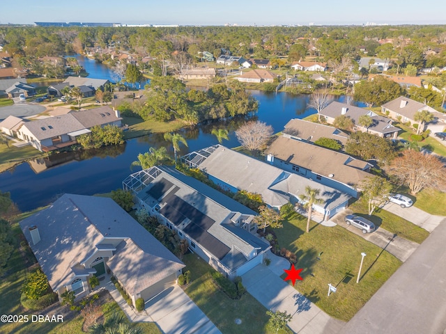 drone / aerial view with a water view