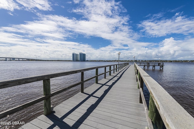 view of dock with a water view