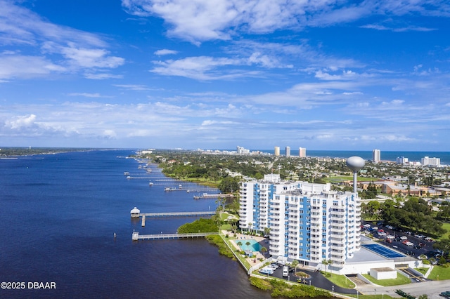 aerial view featuring a city view and a water view