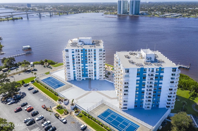 bird's eye view featuring a view of city and a water view