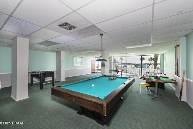 game room featuring visible vents, a paneled ceiling, and carpet floors