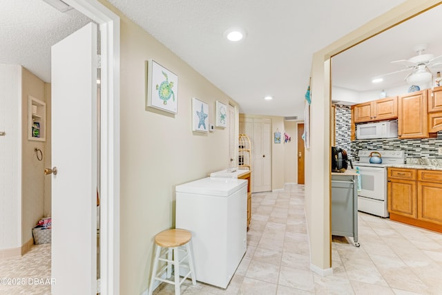 kitchen featuring white appliances, recessed lighting, ceiling fan, light countertops, and tasteful backsplash