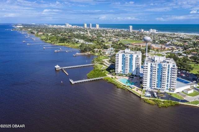 drone / aerial view with a water view and a view of city