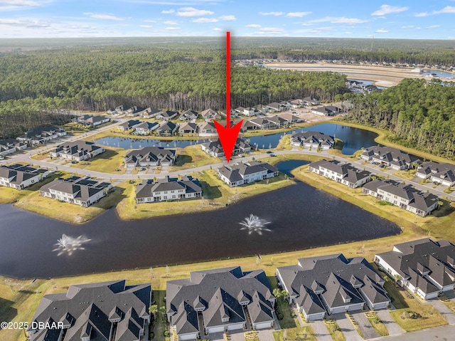 aerial view featuring a residential view and a water view