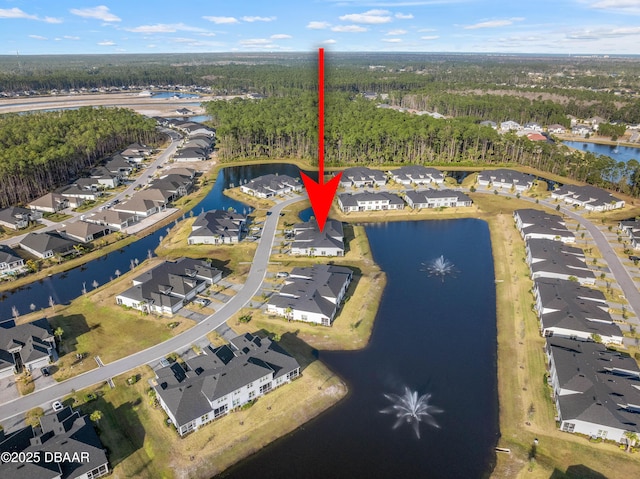 bird's eye view with a water view and a residential view