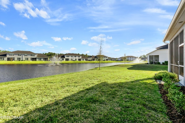 view of yard with a water view