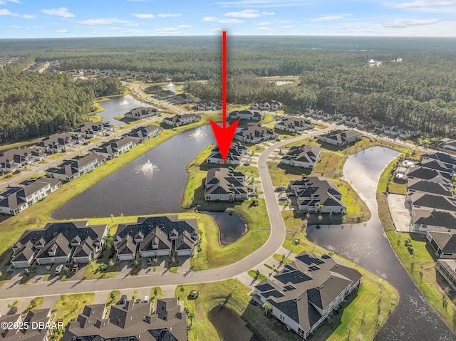 bird's eye view with a water view and a residential view