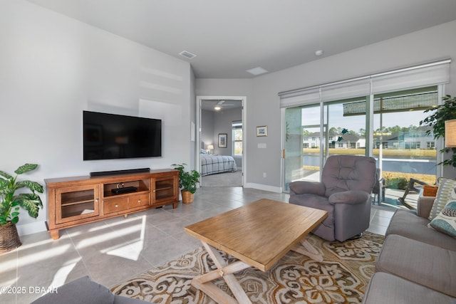 living room featuring light tile patterned floors