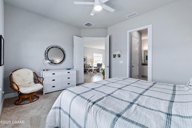 bedroom with carpet, visible vents, and a ceiling fan