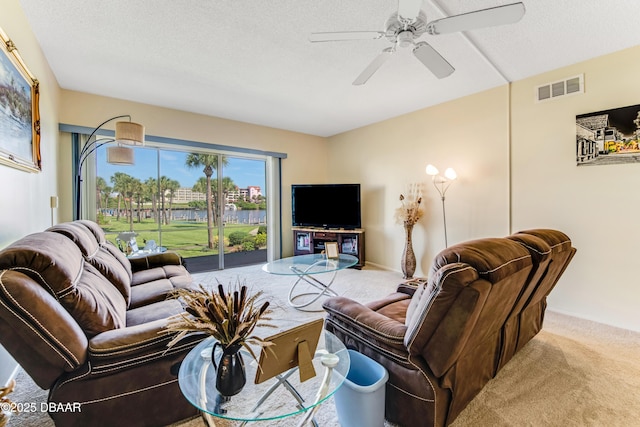 721 S Beach St Unit 205, Daytona Beach, FL 32114 - carpeted living room with ceiling fan