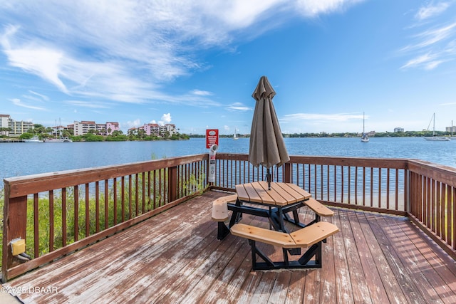 721 S Beach St Unit 205, Daytona Beach, FL 32114 - wooden deck with a water view