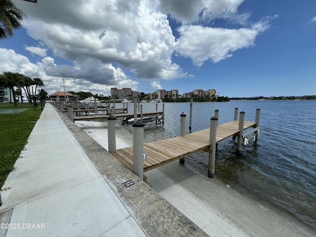721 S Beach St Unit 205, Daytona Beach, FL 32114 - dock featuring a water view